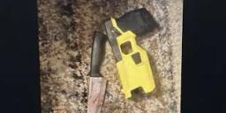 Evidence photo of a kitchen knife and a yellow Axon Taser used by South Brunswick police.