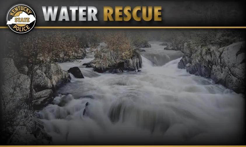 Graphic overlay reading water rescue with Kentucky State Police emblem over a fast flowing rocky river scene.
