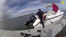 Officer Matt Schmidt at the scene of the bay water rescue.