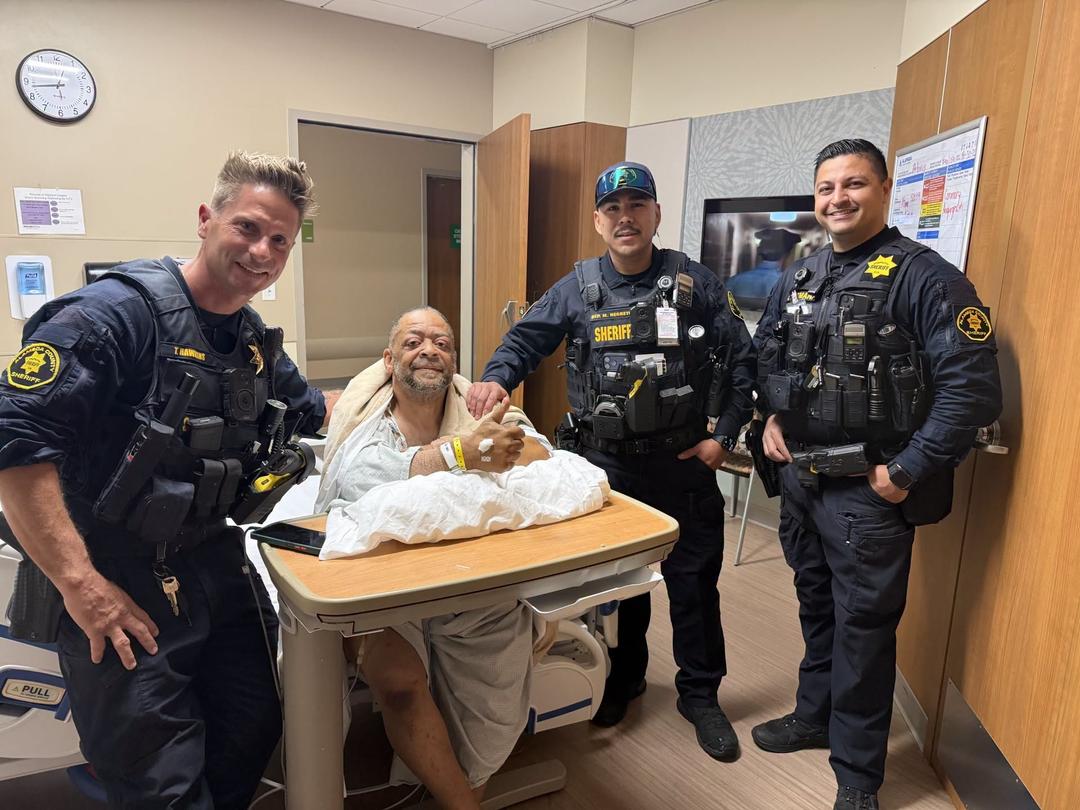 Patient Antonio Gilmore expresses gratitude to responding airport police services deputies inside a local hospital room.
