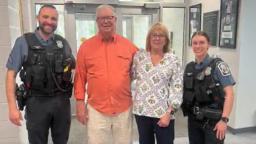 Scott Gardiner and his wife, Kathleen, visiting the Anne Arundel County Eastern District Station