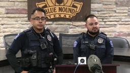Officer Aguilar and Officer Ochoa posing for a photo after being credited with a life-saving rescue in Tarrant County.
