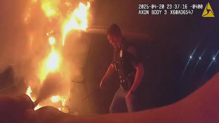 Clarksville police sergeant rescues injured driver from burning truck on I-65