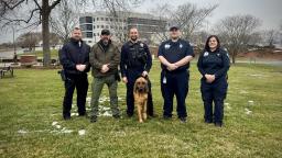 Gastonia NC police officers and K-9 Bo standing in the snow after a successful rescue mission.