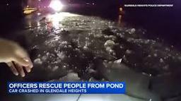 Nighttime rescue scene where Glendale Heights IL police navigate broken ice to reach a car submerged in a pond.
