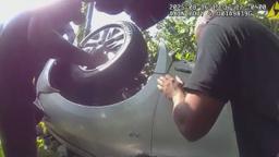 A bodycam view of the South Fulton car crash rescue in progress.