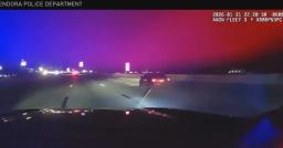 Dashcam view of a Splendora, TX police car pursuing a suspect vehicle at night.