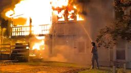 Firefighters and police respond to a house fire in New York where five people were saved.