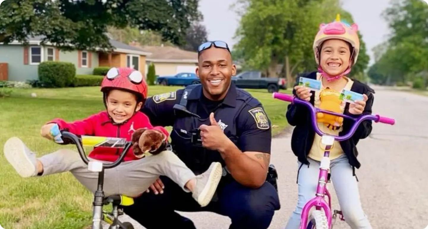 Police officer building community trust with children, a good cop story and uplifting moment